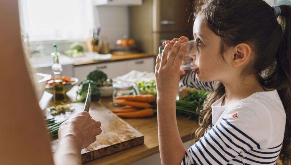 Stocksy_girl_drinking_water
